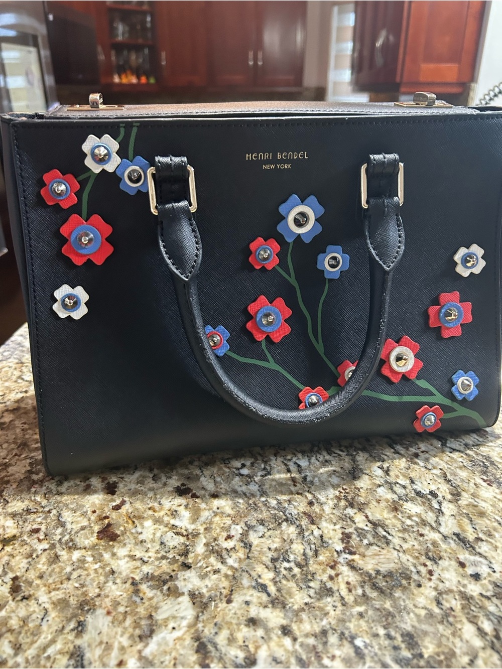 Henri Bendel Black Satchel with Red, Blue and White Floral Accents